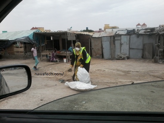 تنظيف الشارع المؤدي إلى الحالة المدنية لحظات قبل وصول الرئيس 